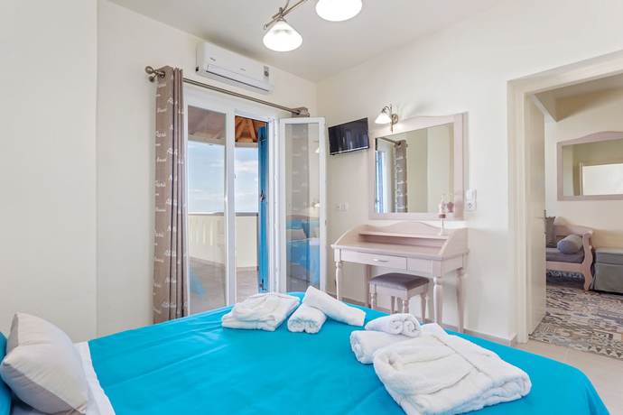 Imagen de la habitación del Hotel Stafylos Suites Boutique. Foto 11