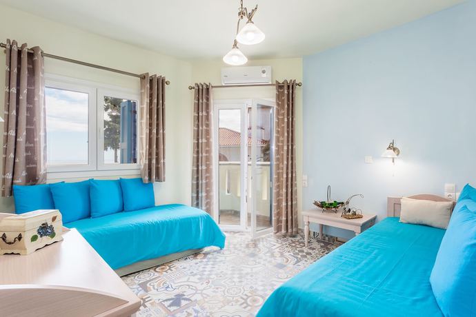 Imagen de la habitación del Hotel Stafylos Suites Boutique. Foto 14