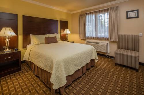 Imagen de la habitación del Hotel Stage Coach Lodge. Foto 3