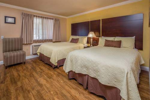 Imagen de la habitación del Hotel Stage Coach Lodge. Foto 5