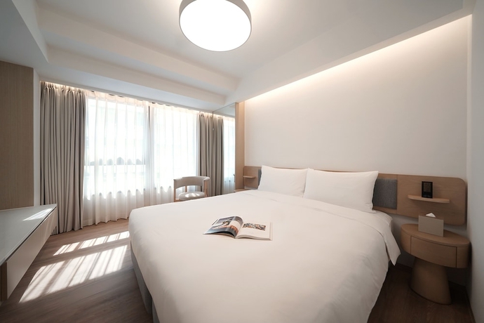 Imagen de la habitación del Hotel Stage Well. Foto 9