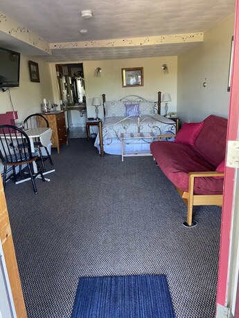 Imagen de la habitación del Hotel Stagecoach House Inn. Foto 19