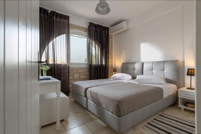 Imagen de la habitación del Hotel Stagones Luxury Villas. Foto 2