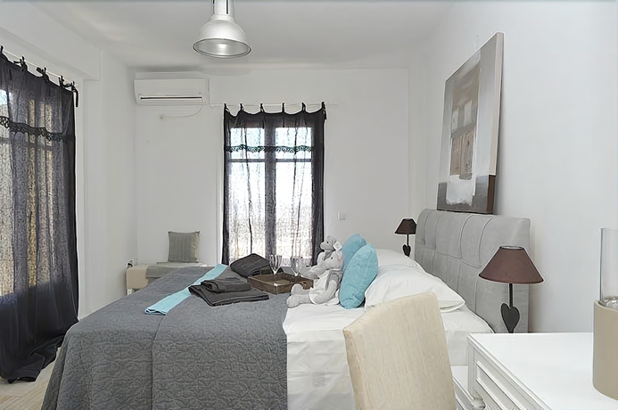 Imagen de la habitación del Hotel Stagones Luxury Villas. Foto 9