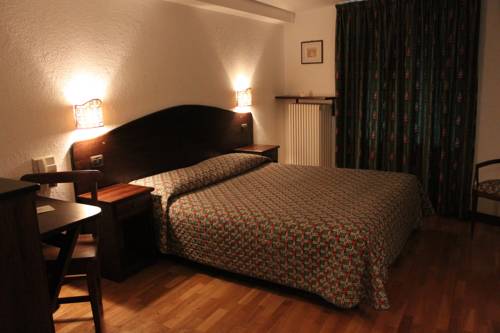 Imagen de la habitación del Hotel Stambecco. Foto 7