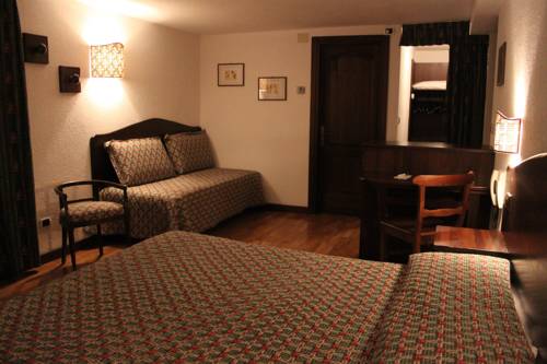 Imagen de la habitación del Hotel Stambecco. Foto 9