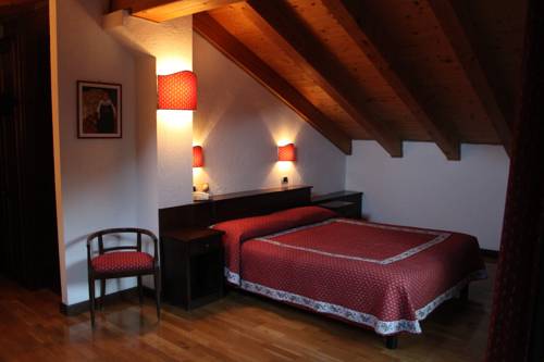 Imagen de la habitación del Hotel Stambecco. Foto 13