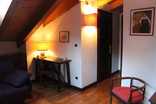 Imagen de la habitación del Hotel Stambecco. Foto 15