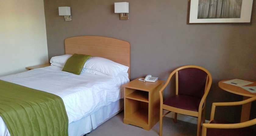 Imagen de la habitación del Hotel Stamford Gate. Foto 13