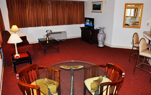 Imagen de la habitación del Hotel Stamford Suites. Foto 1