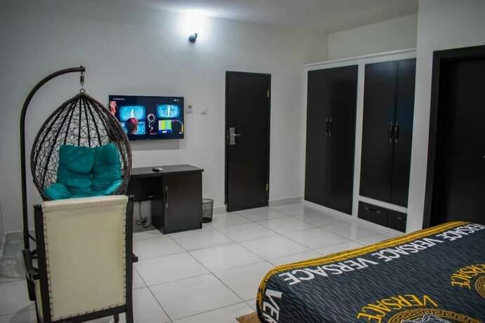 Imagen de la habitación del Hotel Stancorp Suites. Foto 13