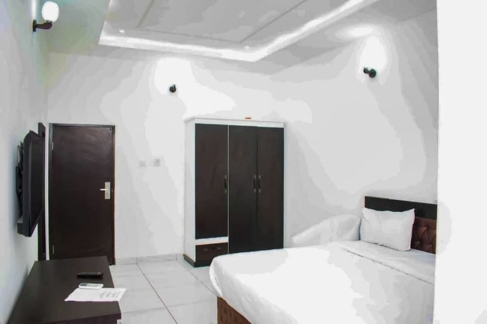 Imagen de la habitación del Hotel Stancorp Suites. Foto 17