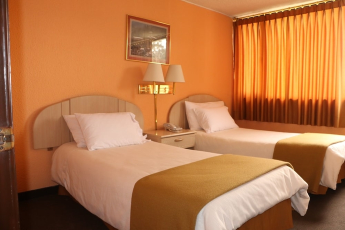 Imagen de la habitación del Hotel Stanford Suites. Foto 19