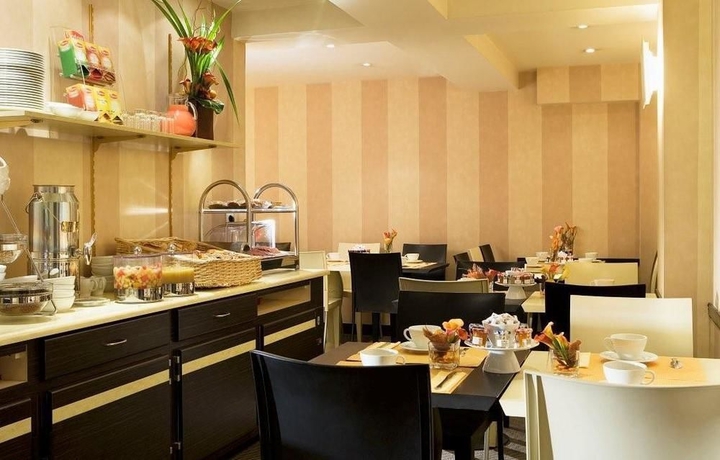 Imagen del bar/restaurante del Hotel Star Champs Elysées. Foto 3