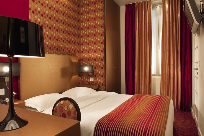 Imagen de la habitación del Hotel Star Champs Elysées. Foto 5