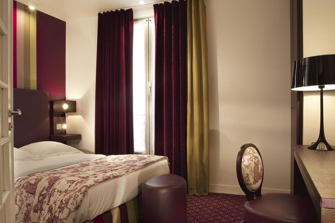 Imagen de la habitación del Hotel Star Champs Elysées. Foto 7