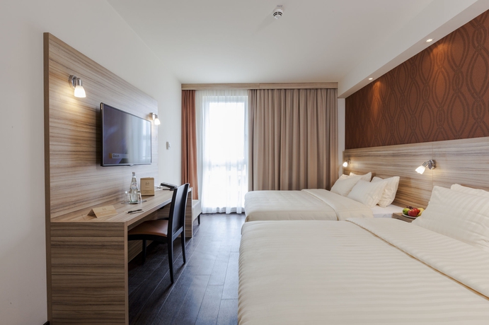 Imagen de la habitación del Hotel Star G Premium München Domagkstraße. Foto 13