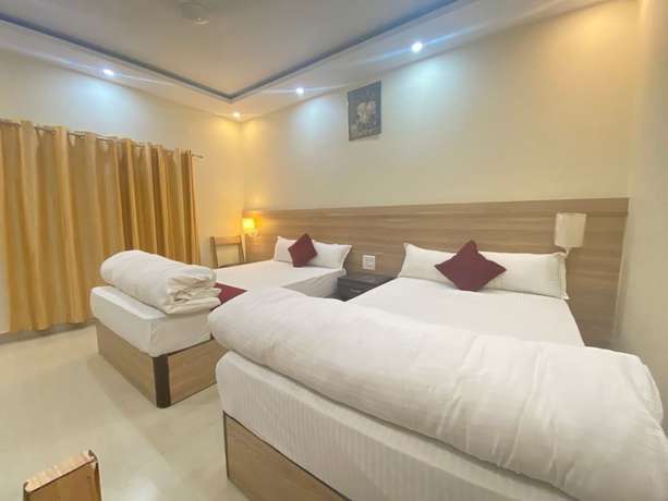 Imagen de la habitación del Hotel Star Holiday, Siddharthanagar. Foto 11