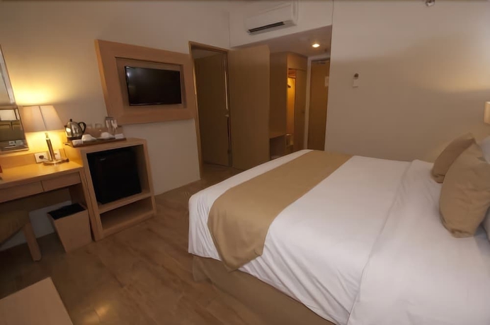 Imagen de la habitación del Hotel Star Hotel Semarang. Foto 7