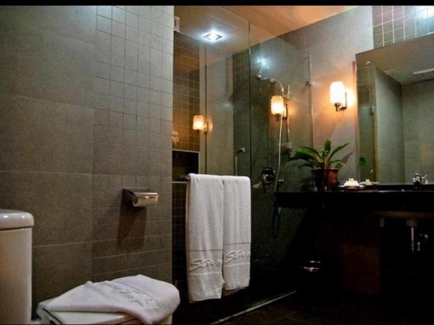 Imagen de la habitación del Hotel Star, Pontianak. Foto 4