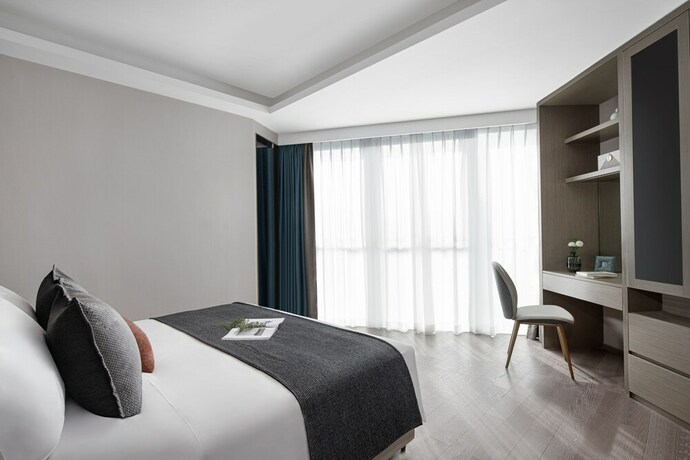 Imagen de la habitación del Hotel Star Residence ICC Guangzhou. Foto 14