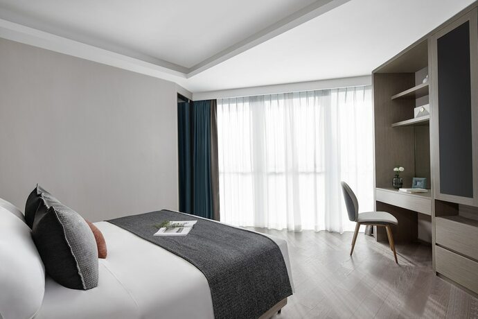 Imagen de la habitación del Hotel Star Residence ICC Guangzhou. Foto 19