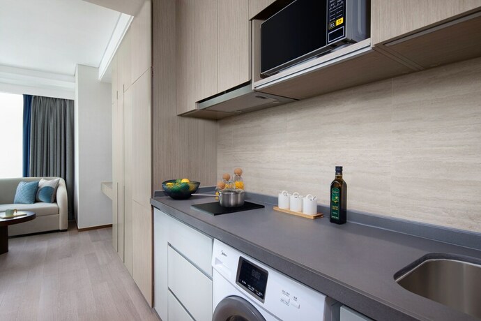 Imagen de la habitación del Hotel Star Residence ICC Guangzhou. Foto 21