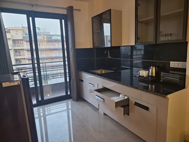 Imagen de la habitación del Hotel Star Residency near Medanta Hospital. Foto 14