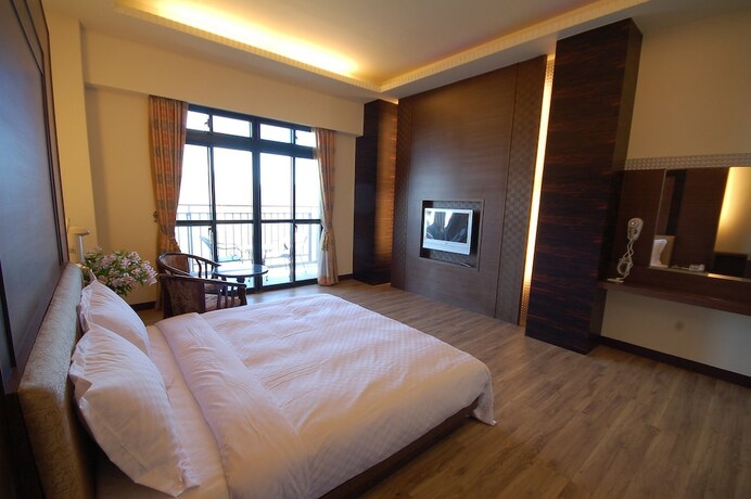 Imagen de la habitación del Hotel Star Villa, Ren'ai. Foto 17