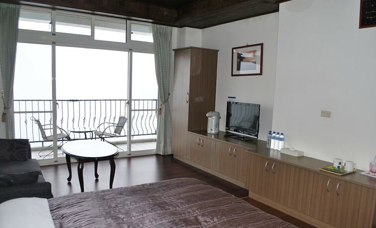 Imagen de la habitación del Hotel Star Villa, Ren'ai. Foto 20