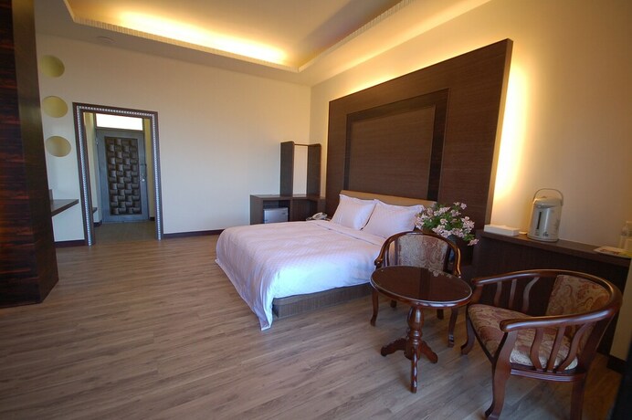Imagen de la habitación del Hotel Star Villa, Ren'ai. Foto 22