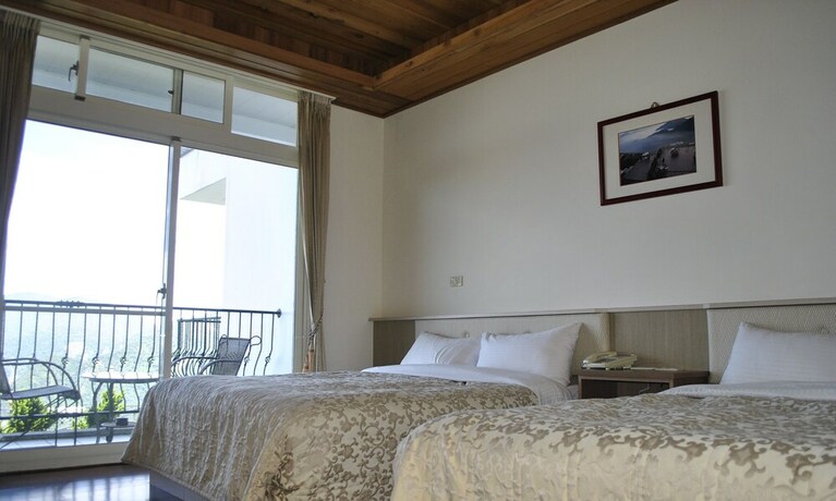Imagen de la habitación del Hotel Star Villa, Ren'ai. Foto 24