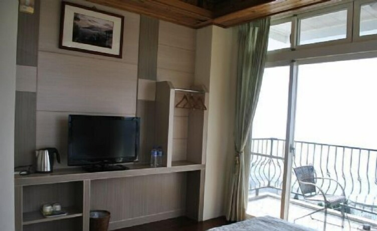 Imagen de la habitación del Hotel Star Villa, Ren'ai. Foto 26
