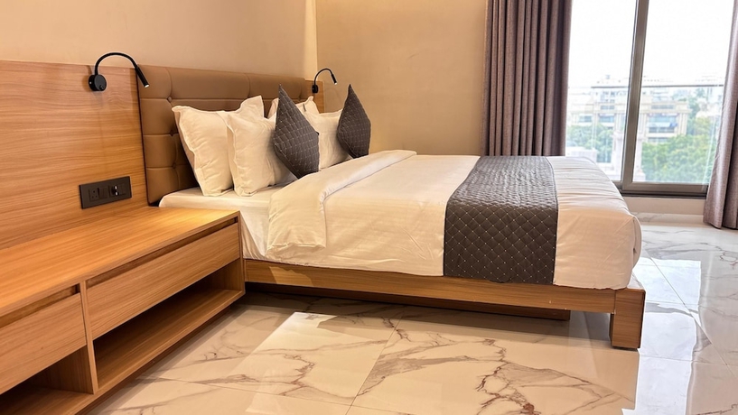 Imagen de la habitación del Hotel Star wood, Rajkot. Foto 2