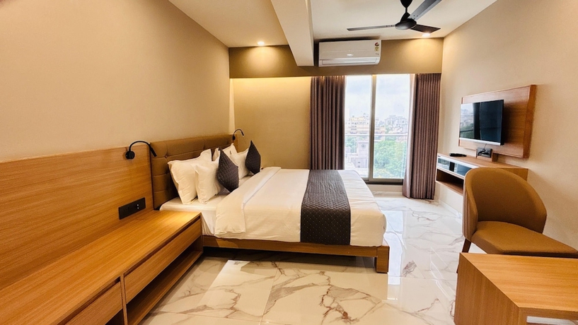 Imagen de la habitación del Hotel Star wood, Rajkot. Foto 3