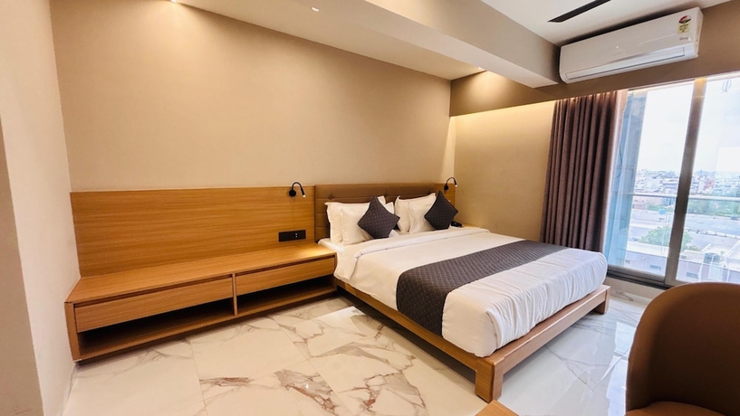 Imagen de la habitación del Hotel Star wood, Rajkot. Foto 4