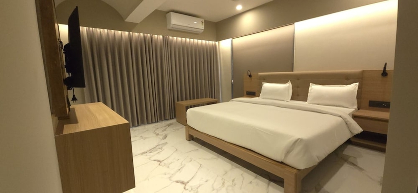 Imagen de la habitación del Hotel Star wood, Rajkot. Foto 7