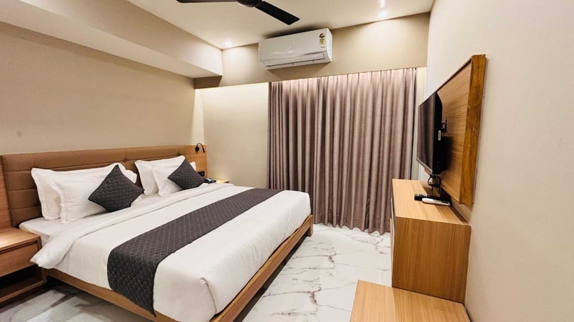 Imagen de la habitación del Hotel Star wood, Rajkot. Foto 8