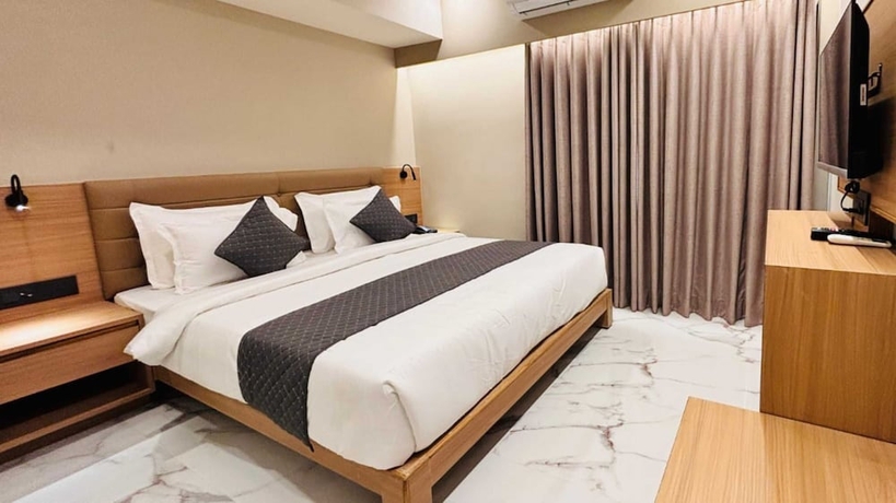 Imagen de la habitación del Hotel Star wood, Rajkot. Foto 10