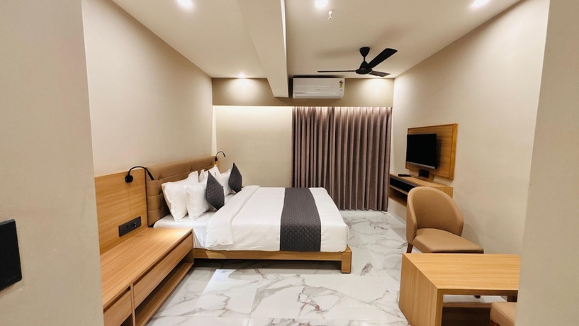 Imagen de la habitación del Hotel Star wood, Rajkot. Foto 11