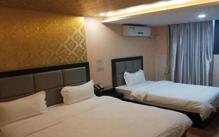 Imagen de la habitación del Hotel StarChain Zengcuoan Xiamen. Foto 6