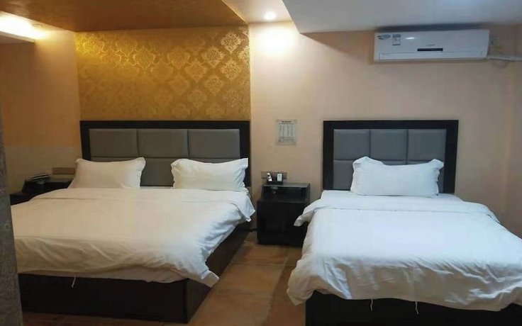 Imagen de la habitación del Hotel StarChain Zengcuoan Xiamen. Foto 7
