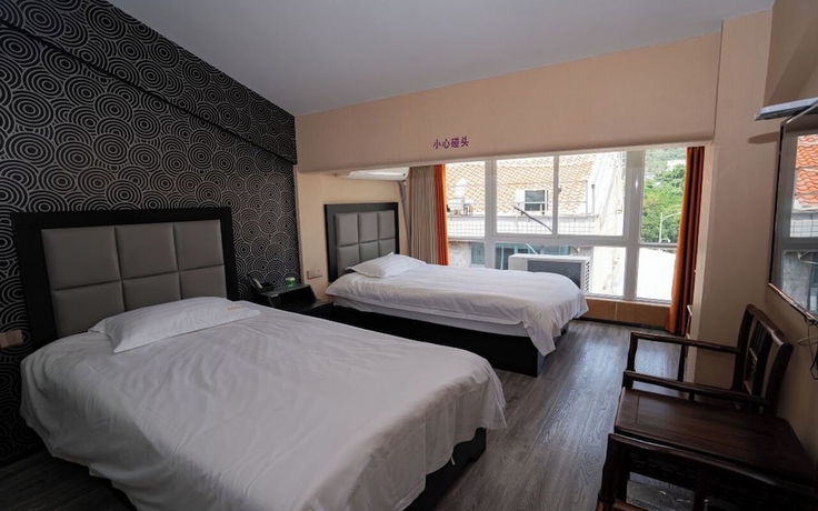 Imagen de la habitación del Hotel StarChain Zengcuoan Xiamen. Foto 10