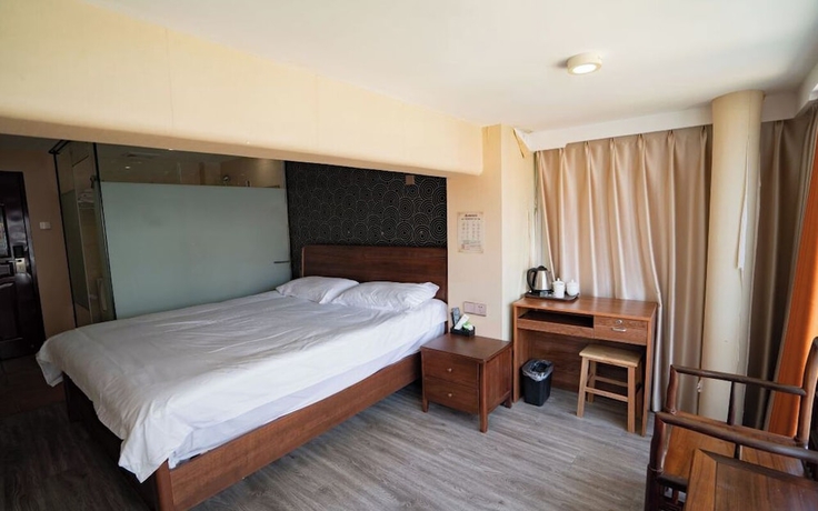 Imagen de la habitación del Hotel StarChain Zengcuoan Xiamen. Foto 12