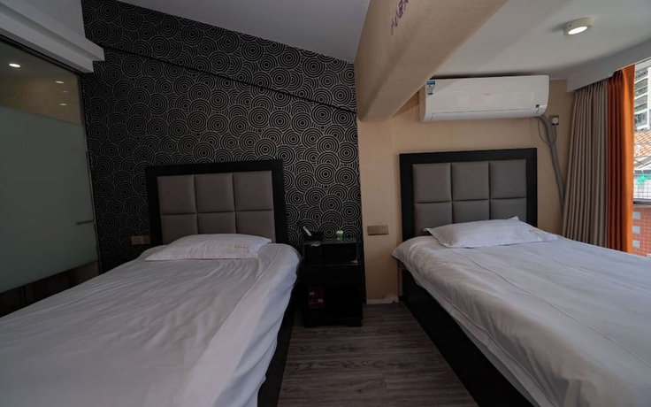 Imagen de la habitación del Hotel StarChain Zengcuoan Xiamen. Foto 13