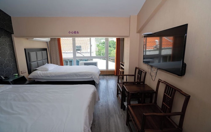 Imagen de la habitación del Hotel StarChain Zengcuoan Xiamen. Foto 16