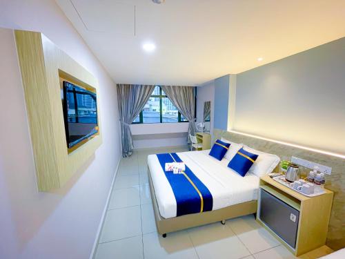 Imagen de la habitación del Hotel StarQ Bukit Bintang. Foto 17