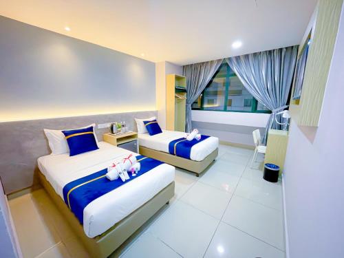 Imagen de la habitación del Hotel StarQ Bukit Bintang. Foto 18
