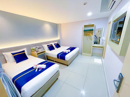 Imagen de la habitación del Hotel StarQ Bukit Bintang. Foto 19