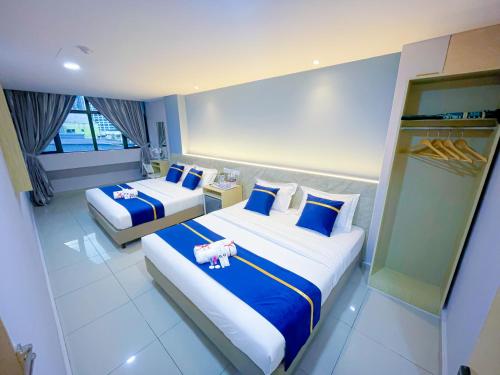 Imagen de la habitación del Hotel StarQ Bukit Bintang. Foto 20